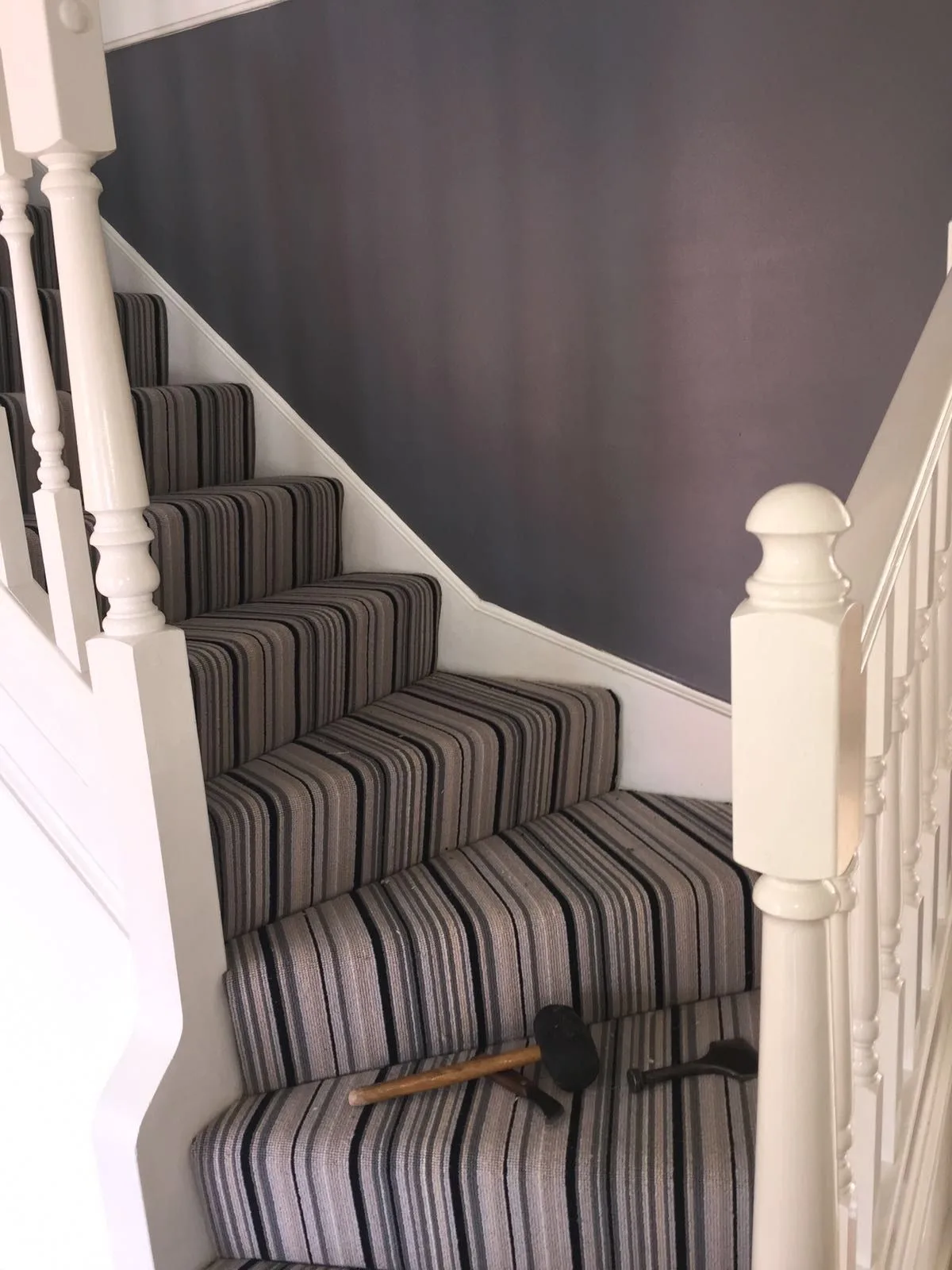 Premium wool stair runner fitted on winding stairs in Streatham, London